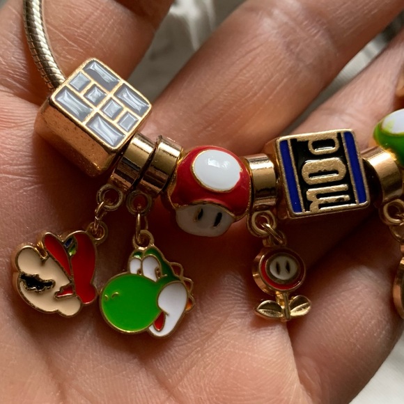 Pandora Rose Gold Pave Heart Clasp Bracelet w/ Super Mario Bros. Themed Charms. - Picture 4 of 14